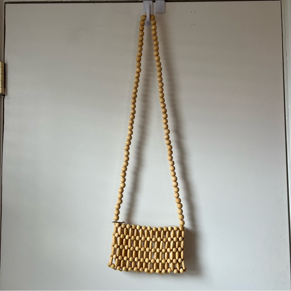 Wood beaded mini cross body bag
